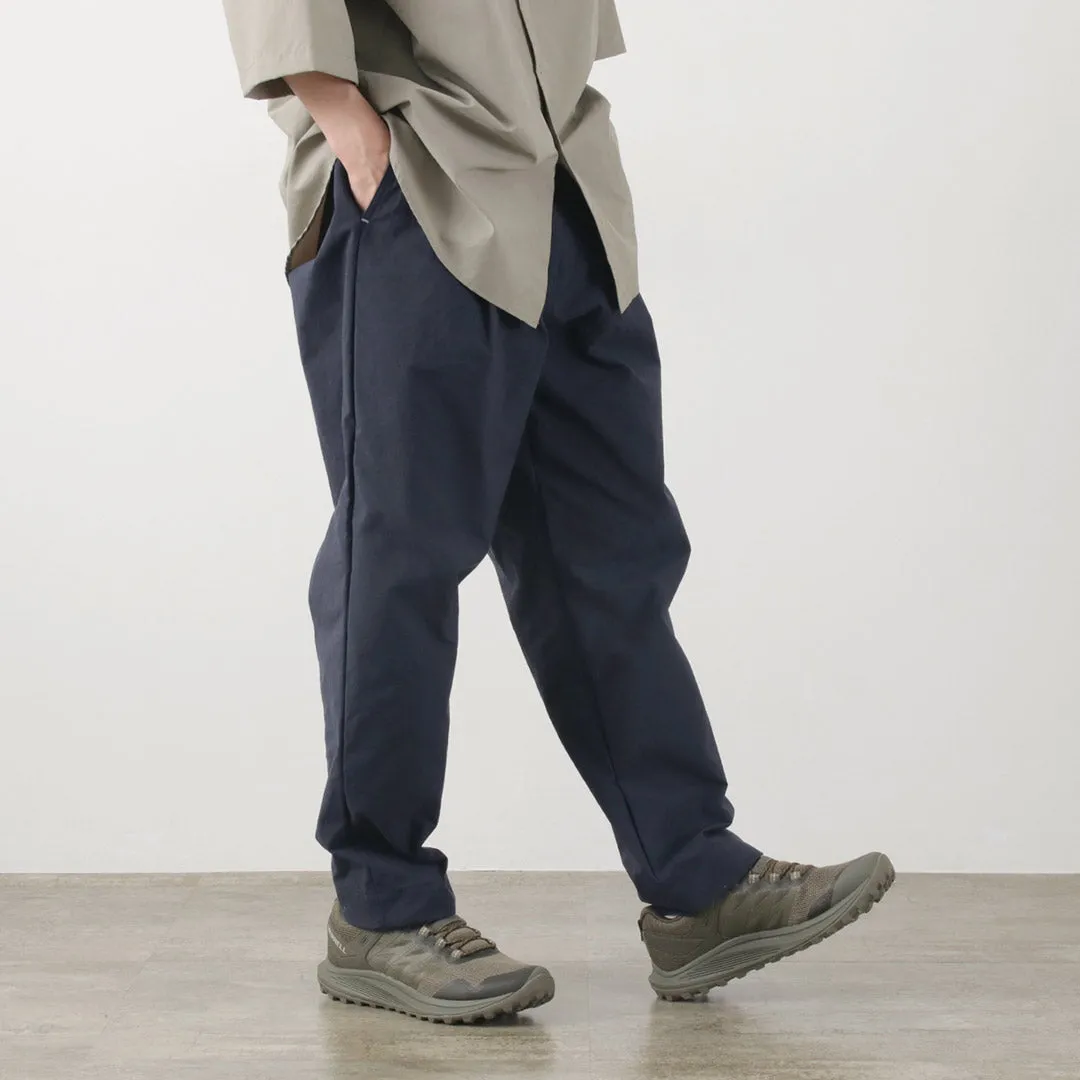 AND WANDER / Nylon Chino Tucked Tapered Pants