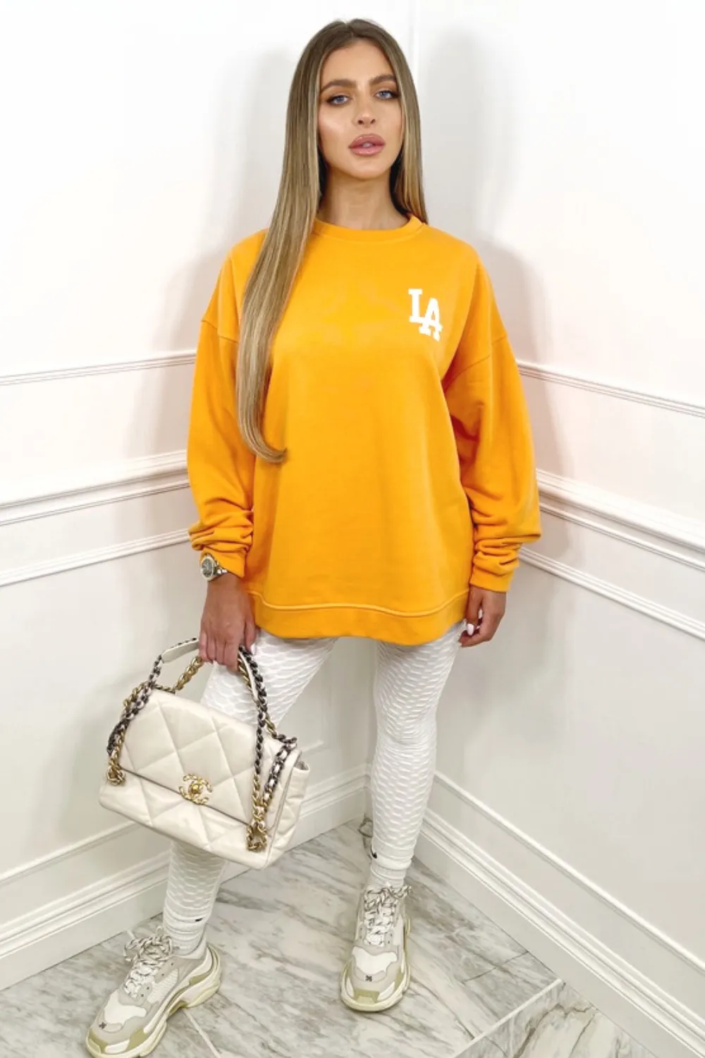 LA orange oversized back print sweater