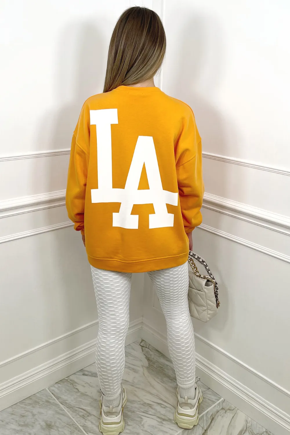 LA orange oversized back print sweater