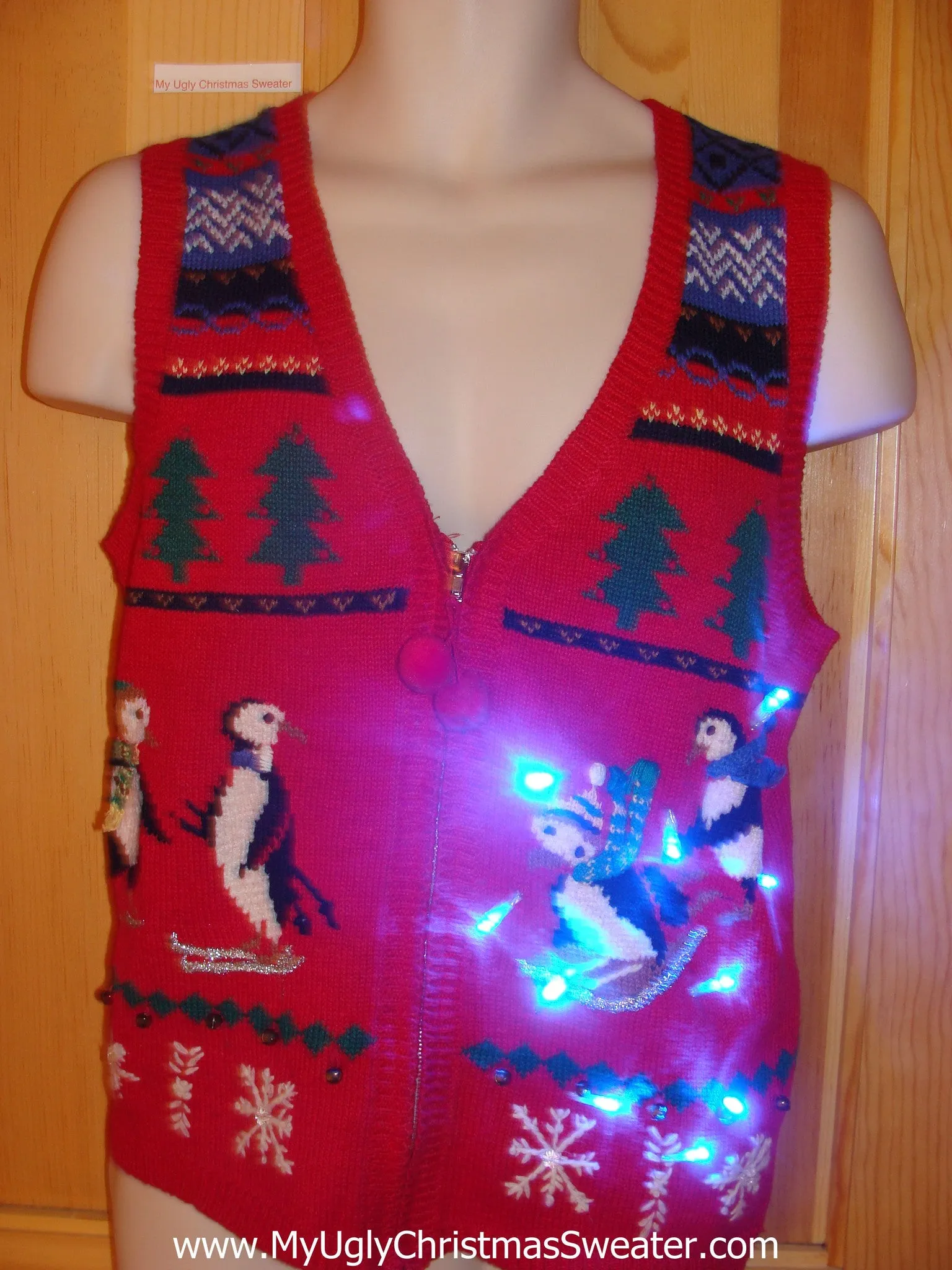 Need to Buy Christmas Sweaters? Light Up Sweater Vest Skiing Penguins